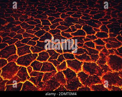 Heat red cracked ground texture burning after volcano eruption. Molten active lava texture background. Armageddon natural disaster or hell concept. Ea Stock Photo