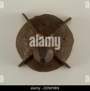 Decorative door boss and nail, Wrought iron, Hemispherical boss divided into eight triangular sections by paired parallel wrought lines. Nail has a pyramidal head on a square shank., Spain, 15th century, metalwork, Decorative Arts, Decorative door boss and nail Stock Photo