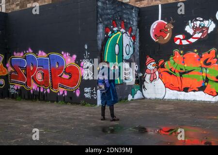 Glasgow, Scotland, UK. 17th December, 2020. New festive themed graffiti on Clydeside. Credit: Skully/Alamy Live News Stock Photo