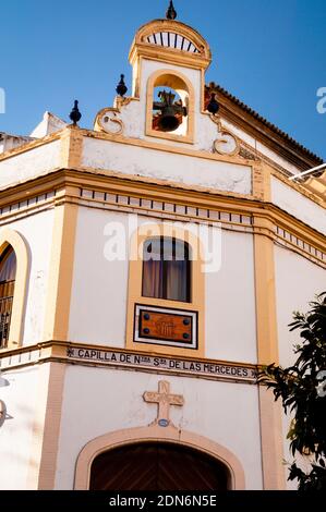 Chapelle de Nuestra Señora da las Mercedes sur la place Puerta Real, Séville, Espagne. Banque D'Images