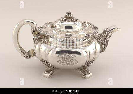 Chrysanthemum, Tiffany & Company, American, established 1853, Raised, cast, chased, and engraved silver, Teapot of squat globular form with reeding, wavy rim, curved handle with ivory insulators, spout with chrysanthemums and foliage; base with four foliate feet; domed and reeded hinged lid with flower bud knop., New York, New York, USA, 1891–1902, metalwork, Decorative Arts, Teapot, Teapot Stock Photo