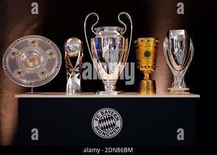 City Of Munich, Deutschland. 17th Dec, 2020. firo: 17.12.2020 football, Bundesliga 1, season 2020/2021, FIFA Men's Player 2020 trophy during the FIFA The BEST Awards ceremony, election as World Player of the Year 2020, trophies and trophies for the 2019/2020 season, FC Bayern-Picture shows the FC Bayern Munich trophies the club won in the 2019/2020 season placed on the stage for the live stream Credit: Pool/Marco Donato-FC Bayern/Pool via Getty Images/via firo Sportphoto | usage worldwide/dpa/Alamy Live News Stock Photo