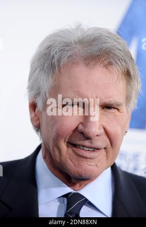 Photo du dossier : Harrison Ford assiste à la première de Warner Bross' 42 au Chinese Theatre de Los Angeles, CA, USA, le 9 avril 2013. La star des films Indiana Jones et Star Wars, âgée de 72 ans, a signalé une panne de moteur et a atterri sur un parcours de golf de Venise à Los Angeles. Il respire et alerte quand les médecins sont arrivés et l'emmenait à l'hôpital dans un état « juste à modéré », a déclaré un porte-parole du service des incendies. Photo de Lionel Hahn/ABACAPRESS.COM Banque D'Images