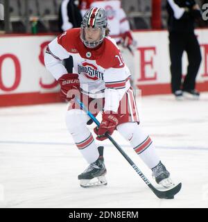 Columbus, Ohio, USA. 17th Dec, 2020. Ohio State Buckeyes forward Michael Gildon (18) handles the puck during warm ups in their game in Columbus, Ohio. Brent Clark/CSM/Alamy Live News Stock Photo