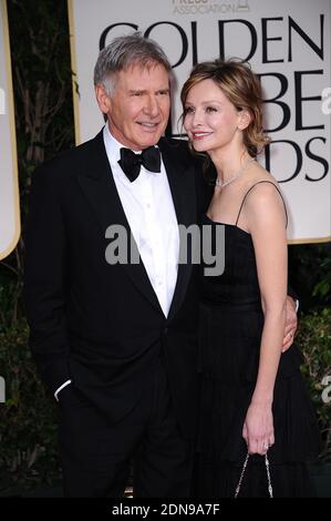 Photo du dossier : Harrison Ford et Calista Flockhart arrivent pour la 69e cérémonie annuelle des Golden Globe Awards, qui s'est tenue à l'hôtel Beverly Hilton de Los Angeles, CA, Etats-Unis le 15 janvier 2012. La star des films Indiana Jones et Star Wars, âgée de 72 ans, a signalé une panne de moteur et a atterri sur un parcours de golf de Venise à Los Angeles. Il respire et alerte quand les médecins sont arrivés et l'emmenait à l'hôpital dans un état « juste à modéré », a déclaré un porte-parole du service des incendies. Photo de Lionel Hahn/ABACAPRESS.COM Banque D'Images