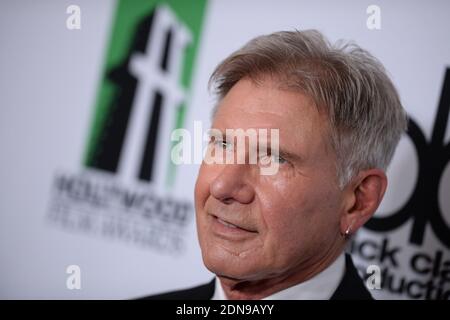 Photo du dossier : Harrison Ford arrive pour le 17e gala annuel des Hollywood film Awards présenté par le Los Angeles Times à l'hôtel Beverly Hilton à Beverly Hills, Los Angeles, CA, USA le 21 octobre 2013. L'événement récompense l'excellence dans l'art du cinéma ainsi que le talent créatif au sein de la communauté mondiale. La star des films Indiana Jones et Star Wars, âgée de 72 ans, a signalé une panne de moteur et a atterri sur un parcours de golf de Venise à Los Angeles. Il respire et alerte quand les médecins sont arrivés et l'emmena à l'hôpital dans un état « juste à modéré », un service d'incendie Banque D'Images