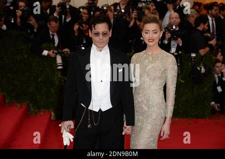 Johnny Depp and Amber Heard made it legal at their home in Los Angeles on Tuesday, People mag says. A bigger wedding is still to come this weekend on Depp's private island (Little Hall's Pond Cay) in the Bahamas. File photo : Johnny Depp and Amber Heard attend the 2014 Metropolitan Museum of Art's Costume Institute Benefit Gala celebrating the opening of the exhibition 'Charles James: Beyond Fashion' and the new Anna Wintour Costume Center, in New York City, NY, USA on May 5, 2014. Photo by Briquet-Douliery/ABACAPRESS.COM Banque D'Images