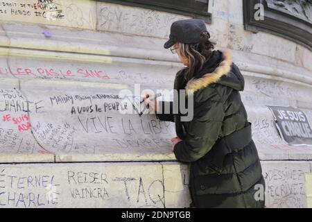 Flowers, candles, messages and pens honouring the 17 people who died in the Charlie Hebdo and the Hyper Cacher Vincennes massacres on January 07, 2015. The memorial is held at the Place de la Republique in Paris, France and is still constantly visited by mourners on January 12, 2015. Photo by Aurore Marechal/ABACAPRESS.COM Stock Photo