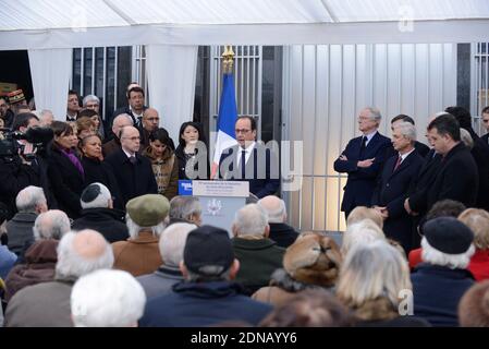 French President Francois Hollande delivers his speech as (L-R) Paris Mayor Anne Hidalgo, Minister of Justice Christiane Taubira, Minister of the Interior Bernard Cazeneuve, Minister of Education, Higher Education and Research Najat Vallaud-Belkacem and Minister of Culture and Communication Fleur Pellerin look on during a ceremony at the Holocaust Memorial in Paris, France on January 27, 2015, to mark the international day of Holocaust remembrance and the 70th anniversary of the liberation of the Auschwitz-Birkenau death camp, site of the largest single number of murders committed during World Stock Photo