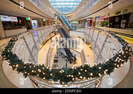 Stuttgart, Germany. 18th Dec, 2020. Fairy lights hang in the empty Königsbau Passage. In Germany, a lockdown has been in place since 16 December 2020 to contain the Corona pandemic. Credit: Tom Weller/dpa/Alamy Live News Stock Photo