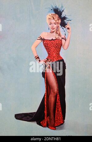 Photographie en couleur de Marilyn Monroe portant une robe rouge et noire. Marilyn Monroe (1926-1962) actrice, mannequin et chanteuse américaine. Banque D'Images
