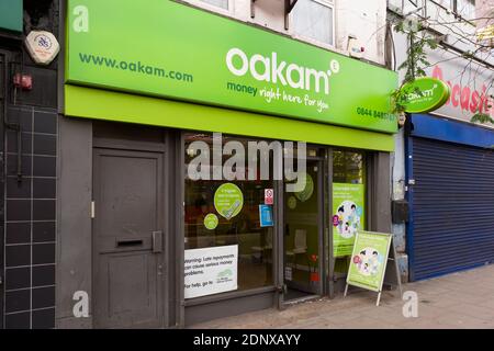 Pay day loan shop. Walworth Road, Southwark, London, UK.  A cap on the amount that payday lenders can charge their customers has been announced by the City regulator.  Financial Conduct Authority (FCA), has announced new regulations for payday loans companies. The rates will be capped at 0.8% of the amount borrowed a day, the changes will come into force from January 2015. Pay day loan shop.  Walworth Road, Southwark, London, UK.  11 Nov 2014 Stock Photo