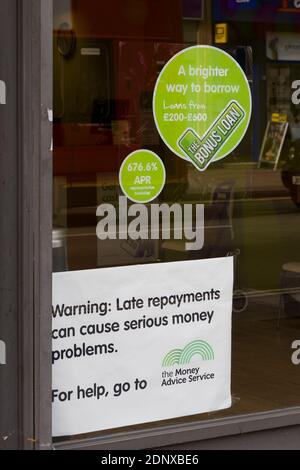 Pay day loan shop. Walworth Road, Southwark, London, UK.  A cap on the amount that payday lenders can charge their customers has been announced by the City regulator.  Financial Conduct Authority (FCA), has announced new regulations for payday loans companies. The rates will be capped at 0.8% of the amount borrowed a day, the changes will come into force from January 2015. Pay day loan shop.  Walworth Road, Southwark, London, UK.  11 Nov 2014 Stock Photo