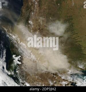 At 3:35 p.m. local time (1835 Universal Time) on April 23, 2015, the Moderate Resolution Imaging Spectroradiometer (MODIS) on NASA’s Terra satellite acquired an image as the tan plume continued moving north and east. Photo by NASA/AABACAPRESS.COM Stock Photo