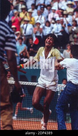 Congratulated by his father France's Yannick Noah winner of the French Tennis Open against Sweden's Mats Wilander In Roland-Garros Stadium, Paris, France on May 23th, 1983. Photo by Henri Szwarc/ABACAPRESS.COM Stock Photo