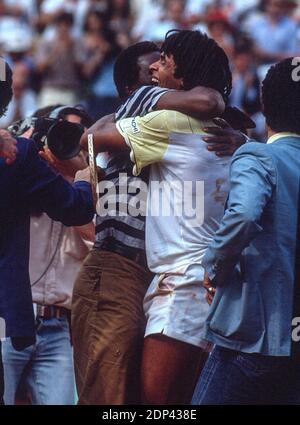 Congratulated by his father France's Yannick Noah winner of the French Tennis Open against Sweden's Mats Wilander In Roland-Garros Stadium, Paris, France on May 23th, 1983. Photo by Henri Szwarc/ABACAPRESS.COM Stock Photo