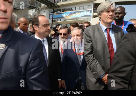 Le président François Hollande, Stephane LeFoll, Pierre Fillon , président français de l'automobile Club de l'Ouest (ACO), en charge de l'organisation de la course d'endurance de 24 heures du Mans et le président français de la FIA Jean Todt arrivant avant le début de la 83e course d'endurance de 24 heures du Mans, au Mans, ouest de la France, le 13 juin 2015. Photo de Guy Durand/ABACAPRESS.COM Banque D'Images
