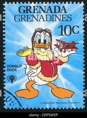 GRENADE - VERS 1979 : timbre imprimé par Grenade, présente les personnages de Walt Disney, Pilot Donald Duck, vers 1979 Banque D'Images