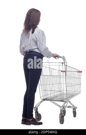 Vue latérale d'une belle femme avec chariot sur fond blanc Banque D'Images