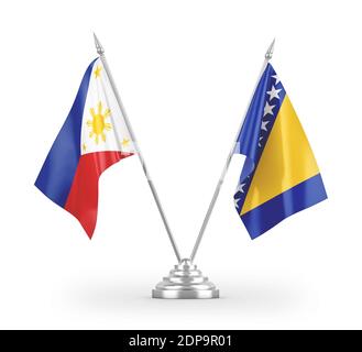 Les drapeaux de table de Bosnie-Herzégovine et des Philippines sont isolés sur du blanc Banque D'Images