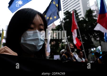 HONG KONG - MANIFESTATION - MARCHE DES CONSULATS A Hong Kong, le mouvement pro-démocratique manifeste de consultation en consultant pour demander le soutien de la c Banque D'Images
