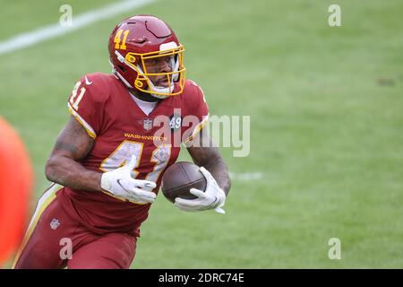 20 décembre 2020 : L'équipe de football de Washington qui a fait une course de retour J.D. McKissic (41) remonte à la réception et l'emmène dans la zone finale pour un toucher de tête pendant le match de la NFL entre le match de la saison régulière de la NFL entre les Seahawks de Seattle et l'équipe de football de Washington joué au FedEx Field à Landover, Maryland. Photographe: Cory Royster Banque D'Images