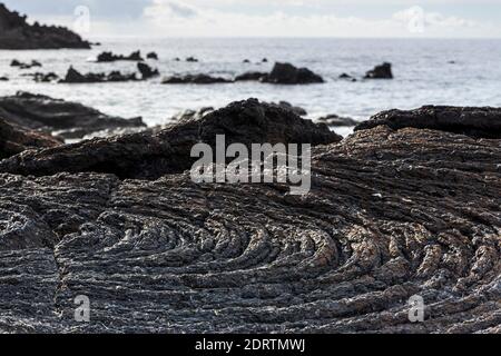 Pahoehoe, opie lave, formations rocheuses volcaniques sur la côte ouest, Playa San Juan, Tenerife, Iles Canaries, Espagne Banque D'Images