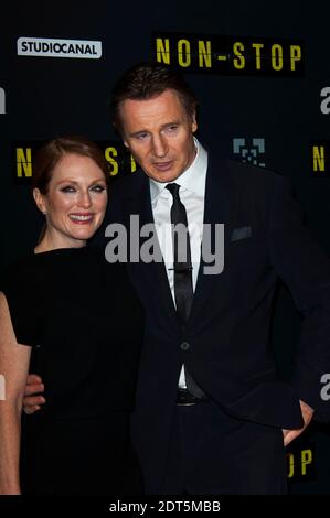 Julianne Moore et Liam Neeson participant à la première française du film 'NON STOP' qui s'est tenu au Gaumont Opera Cinema à Paris, France, le 27 2014 janvier. Photo de Nicolas Genin/ABACAPRESS.COM Banque D'Images