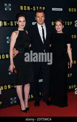 Julianne Moore, Michelle Dockery et Liam Neeson assistent à la première française du film 'NON STOP' qui s'est tenu au Gaumont Opera Cinema à Paris, France, le 27 2014 janvier. Photo de Nicolas Genin/ABACAPRESS.COM Banque D'Images