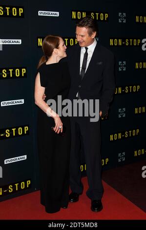 Julianne Moore et Liam Neeson participant à la première française du film 'NON STOP' qui s'est tenu au Gaumont Opera Cinema à Paris, France, le 27 2014 janvier. Photo de Nicolas Genin/ABACAPRESS.COM Banque D'Images