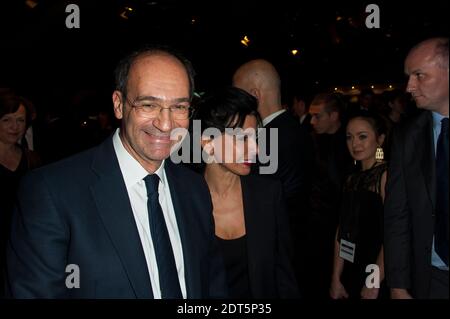 L'ancien ministre du budget Eric Woerth et Rachida Dati assistent au 29e Festival international de l'automobile qui s'est tenu à l'Hôtel des Invalides, à Paris, en France, le 28 2014 janvier. Photo de Nicolas Genin/ABACAPRESS.COM Banque D'Images