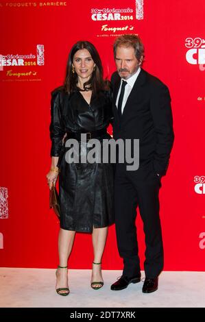 Geraldine Pailahas et Christopher Thompson arrivent pour le dîner de gala à la suite de la 39e cérémonie de césarienne (Prix du cinéma français), qui s'est tenue au restaurant du Fouquet à Paris, en France, le 28 février 2014 à Paris, en France. Photo de Nicolas Genin/ABACAPRESS.COM Banque D'Images