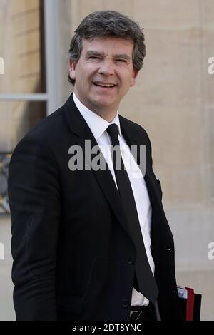 Le ministre français du renouveau industriel Arnaud Montebourg quitte la réunion hebdomadaire du cabinet à l'Elysée, à Paris, le 12 mars 2014. Photo de Stephane Lemouton/ABACAPRESS.COM Banque D'Images