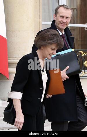 Guillaume Garot, ministre français adjoint de l'agriculture, de l'agro-industrie et des forêts, et Michele Delaunay, ministre adjoint des personnes âgées et handicapées quittent la réunion hebdomadaire du cabinet à l'Elysee Presidential Palace, à Paris, en France, le 19 mars 2014. Photo de Stephane Lemouton/ABACAPRESS.COM Banque D'Images