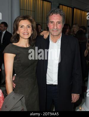 Jean-Jacques Bourdin et sa femme Anne Nivat assistent à la fête néo-burlesque tenue à l'Hôtel Vernet à Paris, France, le 20 mars 2014. Photo de Laurent Zabulon/ABACAPRESS.COM Banque D'Images