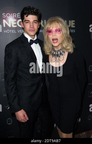 Amanda Lear et Tarik Lakehal assistaient à la fête néo-burlesque tenue à l'Hôtel Vernet à Paris, France, le 20 mars 2014. Photo de Laurent Zabulon/ABACAPRESS.COM Banque D'Images