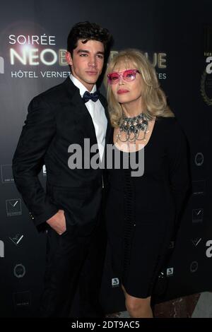 Amanda Lear et Tarik Lakehal assistaient à la fête néo-burlesque tenue à l'Hôtel Vernet à Paris, France, le 20 mars 2014. Photo de Laurent Zabulon/ABACAPRESS.COM Banque D'Images