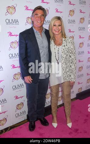 LAS VEGAS, NV - AVRIL 11 : l'animateur Olivia Newton-John (R) et son mari John Easterling assistent à l'inauguration du salon de résidence d'Olivia Newton-John Summer Nights à Flamingo à Las Vegas, Nevada, États-Unis, le 11 avril 2014. Photo de Kobby Dagan/ABACAPRESS.COM Banque D'Images