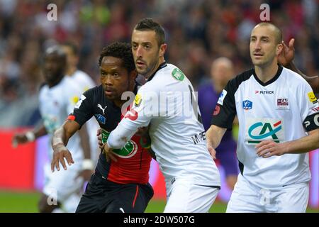 Jean II Makoun de Rennes affronte Jonathan Martins Pereira et Lionel Mathis de Guingamp lors du match de finale de football de la coupe française, Rennes contre Guingamp au Stade de France, St-Denis, France, le 3 mai 2014. Photo de Henri Szwarc/ABACAPRESS.COM Banque D'Images