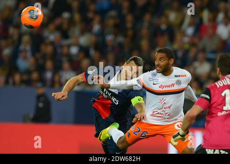 Zlatan Ibrahimovic du PSG, luttant contre Yassine Jebbour de Montpellier lors du match de football de la Ligue française 1, PSG vs Montpellier à Paris, France, le 17 mai 2014. PSG a gagné 4-0. Photo de Henri Szwarc/ABACAPRESS.COM Banque D'Images