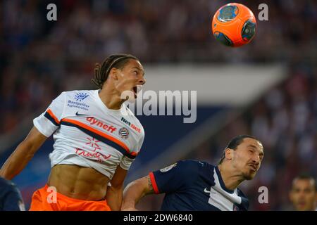 Zlatan Ibrahimovic du PSG s'est affronté contre Daniel Congre de Montpellier lors du match de football de la Ligue française 1, PSG vs Montpellier à Paris, France, le 17 mai 2014. PSG a gagné 4-0. Photo de Henri Szwarc/ABACAPRESS.COM Banque D'Images