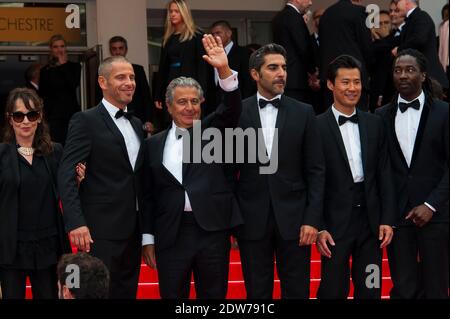 Christian Clavier et Chantal Lauby, Medi Sadoun, Ary Abittan, Frédéric Chau et Noom Diawara arrivent au Palais des Festivals pour la projection du film Jimmy's Hall présenté en compétition dans le cadre du 67e Festival de Cannes, le 22 mai 2014. Photo de Nicolas Genin/ABACAPRESS.COM Banque D'Images