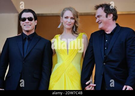 Quentin Tarantino, Uma Thurman, John Travolta arrivée au Palais des Festivals pour la projection du film Sils Maria dans le cadre du 67ème Festival de Cannes, le 23 mai 2014. Photo d'Aurore Marechal/ABACAPRESS.COM Banque D'Images