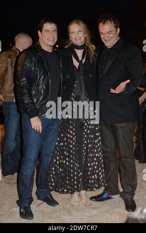John Travolta, Uma Thurman, Quentin Tarantino assister à une projection en bord de mer organisée pour le 20e anniversaire du film de Quentin Tarantino 'Pulp Fiction' dans le cadre du 67ème Festival de Cannes, le 23 mai 2014. Photo de Lionel Hahn/ABACAPRESS.COM Banque D'Images