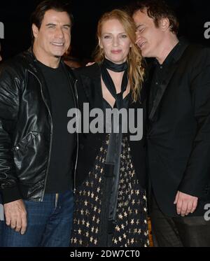 John Travolta, Uma Thurman, Quentin Tarantino assister à une projection en bord de mer organisée pour le 20e anniversaire du film de Quentin Tarantino 'Pulp Fiction' dans le cadre du 67ème Festival de Cannes, le 23 mai 2014. Photo de Lionel Hahn/ABACAPRESS.COM Banque D'Images
