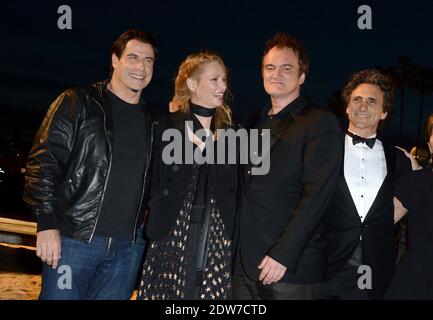 John Travolta, Uma Thurman, Quentin Tarantino, Lawrence Bender assister à une projection en bord de mer organisée pour le 20e anniversaire du film de Quentin Tarantino 'Pulp Fiction' dans le cadre du 67ème Festival de Cannes, le 23 mai 2014. Photo de Lionel Hahn/ABACAPRESS.COM Banque D'Images