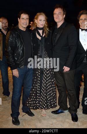 John Travolta, Uma Thurman, Quentin Tarantino assister à une projection en bord de mer organisée pour le 20e anniversaire du film de Quentin Tarantino 'Pulp Fiction' dans le cadre du 67ème Festival de Cannes, le 23 mai 2014. Photo de Lionel Hahn/ABACAPRESS.COM Banque D'Images