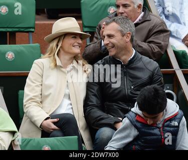 Astrid Bard et son mari Yann Delaigue regardant un match lors de la deuxième partie de l'Open de tennis français à l'arène Roland Garros de Paris, France, le 28 mai 2014. Photo de Laurent Zabulon/ABACAPRESS.COM Banque D'Images