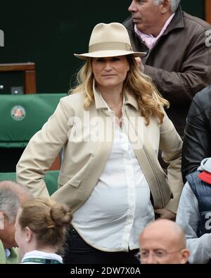 Astrid Bard et son mari Yann Delaigue regardant un match lors de la deuxième partie de l'Open de tennis français à l'arène Roland Garros de Paris, France, le 28 mai 2014. Photo de Laurent Zabulon/ABACAPRESS.COM Banque D'Images