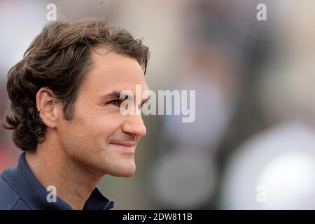 Roger Federer, Suisse, bat 7-5, 6-7 [7], 6-2, 6-4 Dmitry Tursunov, russe, lors de sa 3e partie de l'Open de tennis français au stade Roland Garros à Paris, France, le 30 mai 2014. Photo de Nicolas Briquet/ABACAPRESS.COM Banque D'Images